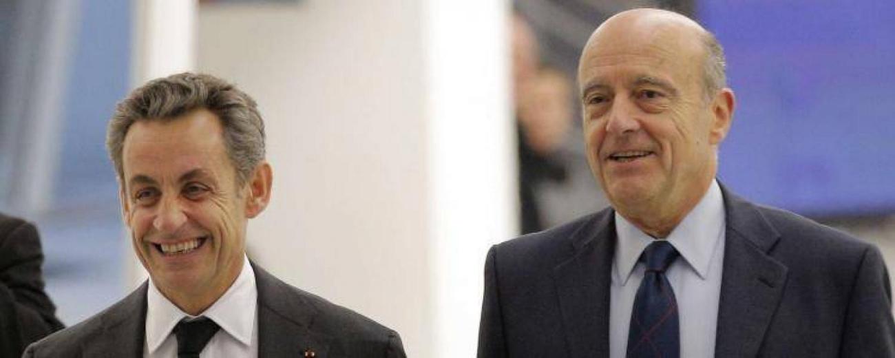 nicolas-sarkozy-alain-juppe-buste-francesoir_field_image_de_base.jpg Nicolas Sarkozy et Alain Juppé au siège de l'UMP.