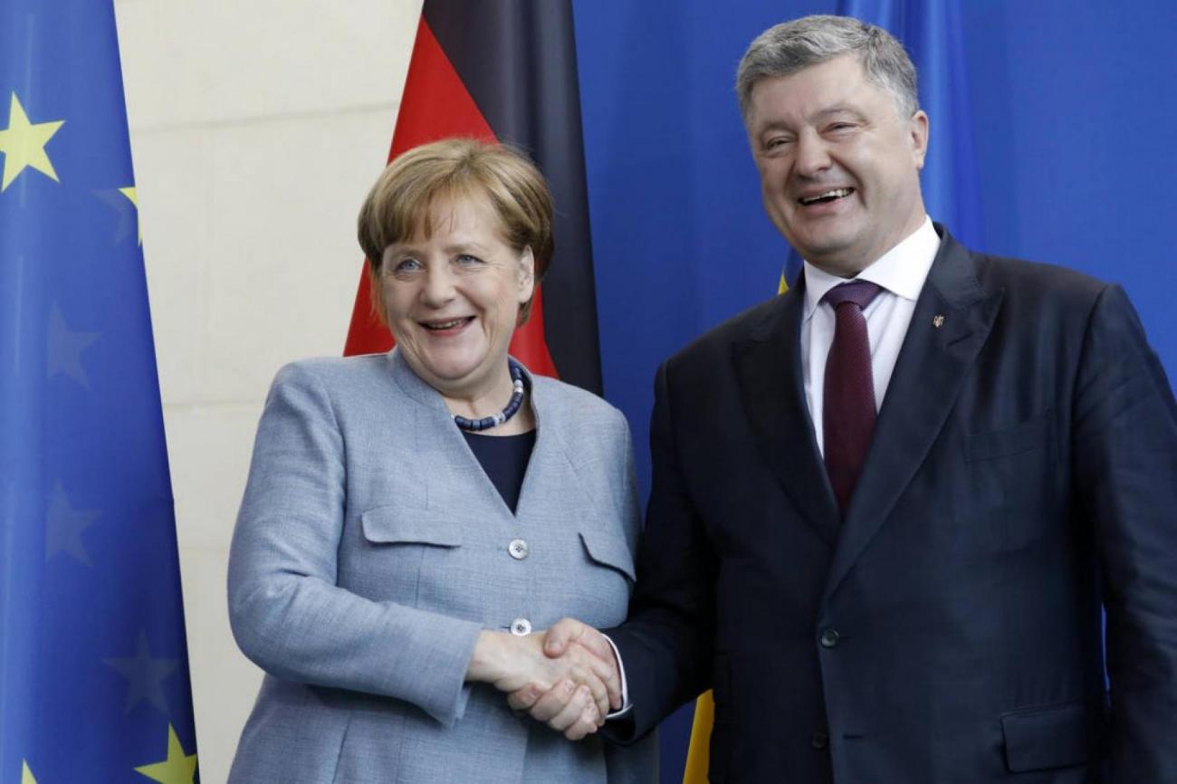 images/ea056d501691d4d3a8692db4b19e24c2aa434ecb.jpg La chancelière allemande ANgela Merkel et le prsident ukrainien Petro Porochenko à Berlin, le 10 avril 2018